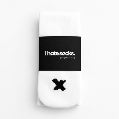 White I Hate Socks kids’ seamless-feel bamboo sock with black X detail